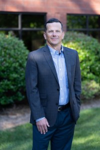 Dr. Adam D. Serlo's professional headshot